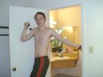 Stretching arms in Addias Sweat pants