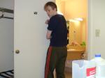 Blue shirt and Addias Sweat pants (butt)