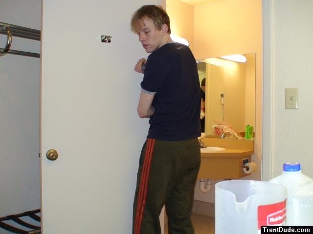 Blue shirt and Addias Sweat pants (butt)