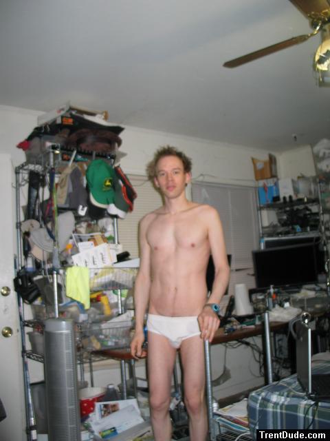 White tommy hilfiger.  The line just above the top of the left side of the briefs is the inguinal crease.