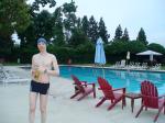 Calvin Klein swim boxers at the pool, swim cap, smile