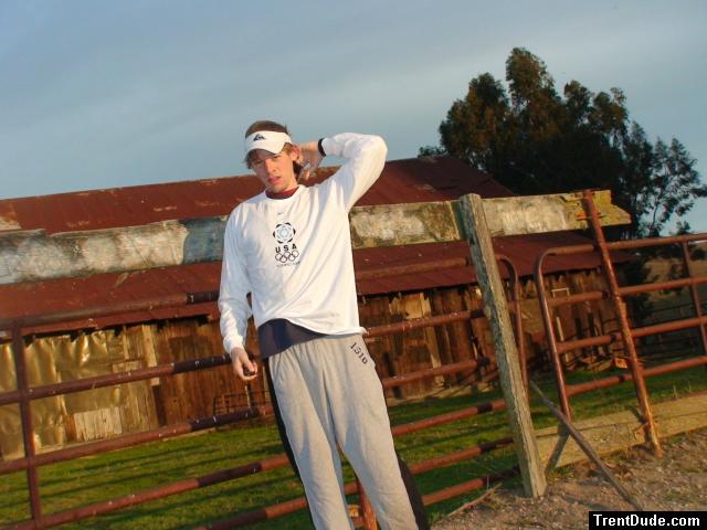 Stretching on a morning on the farm with Cypress tree in backgroung
