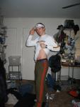 Spiderman boxers showing under Green sweat pants