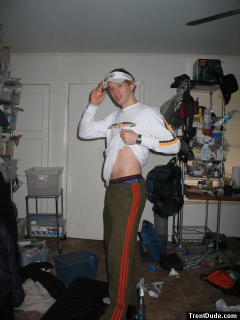 Spiderman boxers showing under Green sweat pants