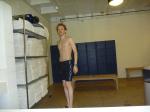 Nike swim jammer in a locker room with many towels (best)