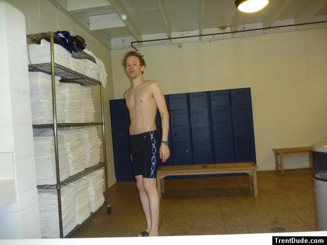 Nike swim jammer in a locker room with many towels (best)