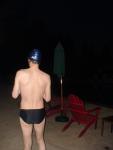 Nike black/blue swim brief (size 34), speedo swim cap, rear