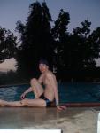 Leg muscles, sitting in a Nike swim brief (best)