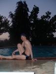 Leg muscles, sitting in a Nike swim brief (best)