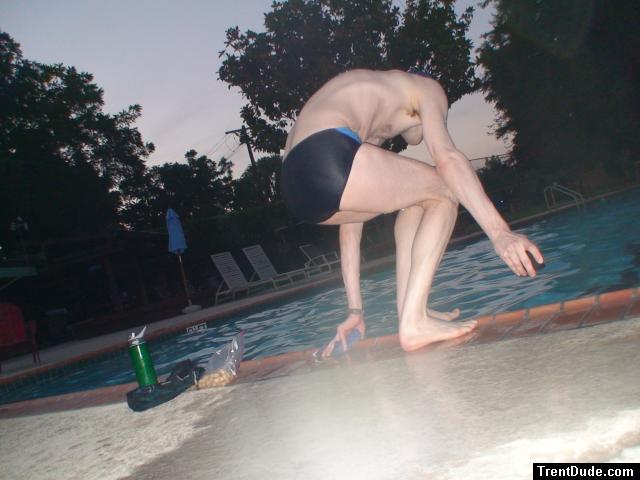 Getting ready to jump in wearing a Nike swim brief (rear)