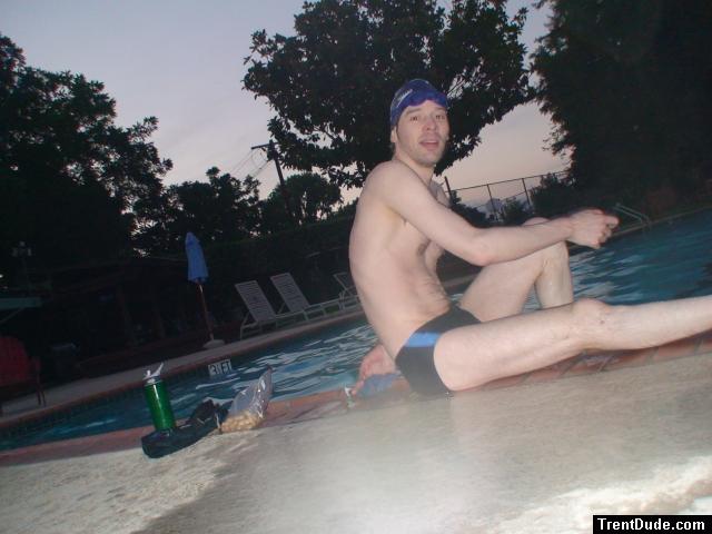 Sitting down next to the pool after a swim
