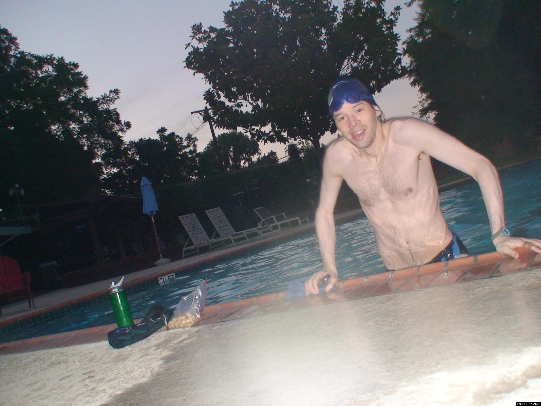 Climbing out of the pool after a swim (abs, chest hair)