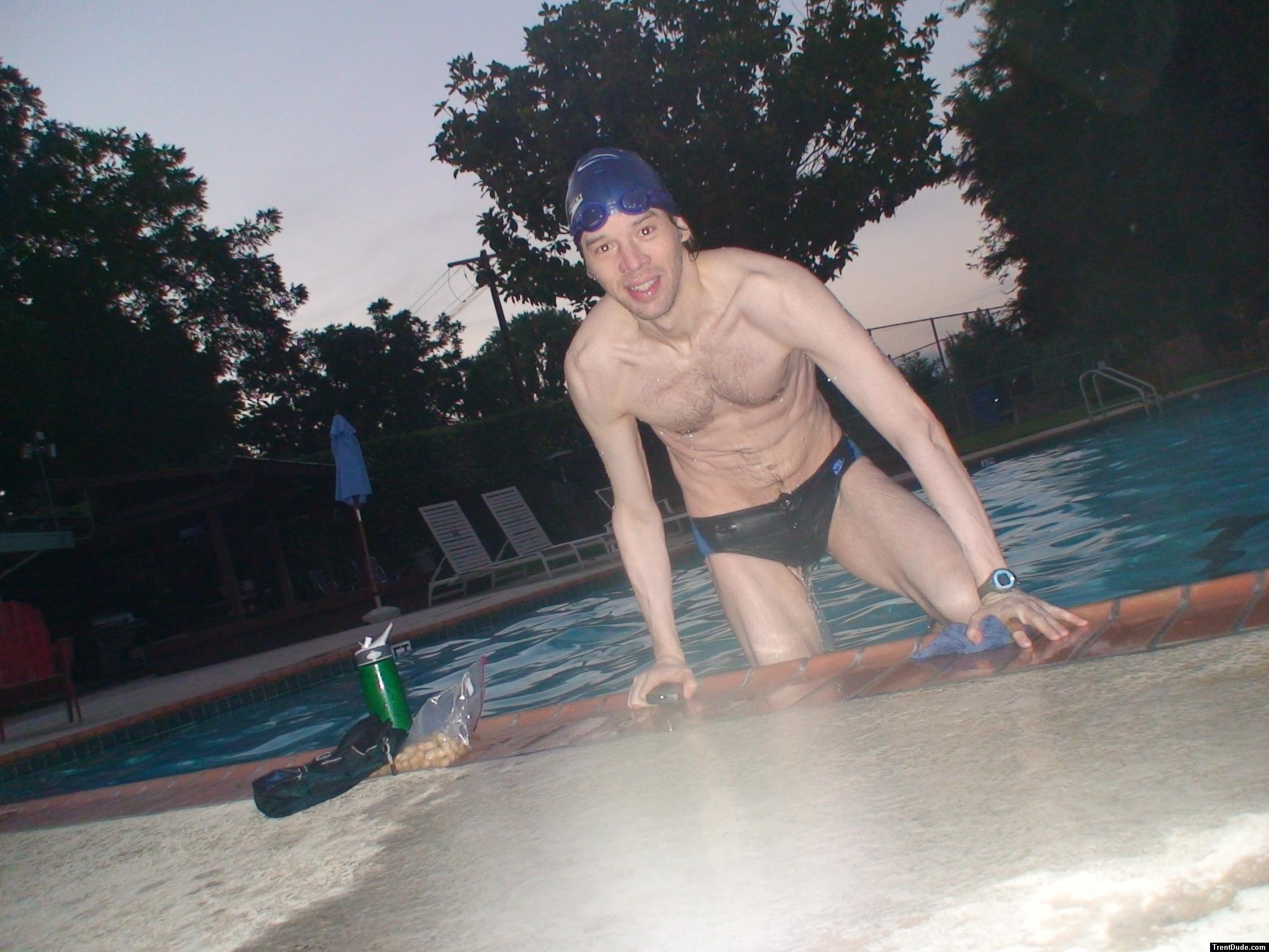 Climbing out of the pool after a swim (abs, chest hair)