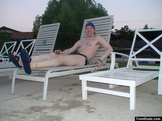Relaxing in a deck chair at the pool after a long swim