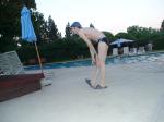 Nike black/blue swim brief, stretching