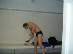 Checking his phone before leaving the locker room