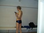 Checking his phone before leaving the locker room