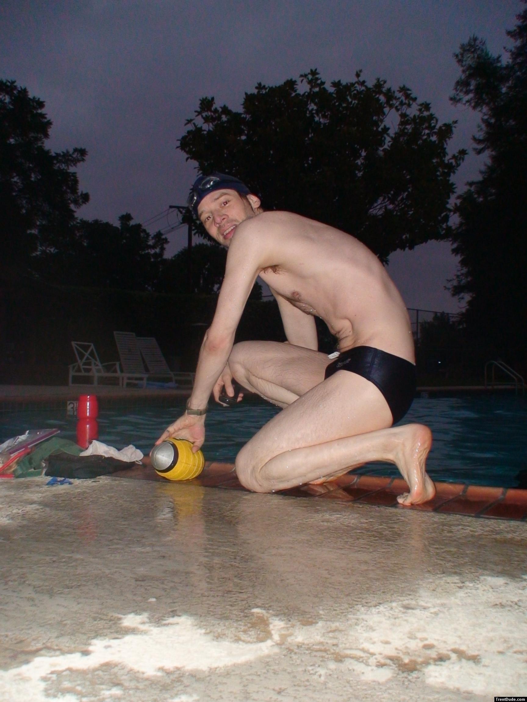 Swim team speedo size 30, playing with a football, foot