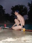 Swim team speedo size 30, relaxing next to the pool