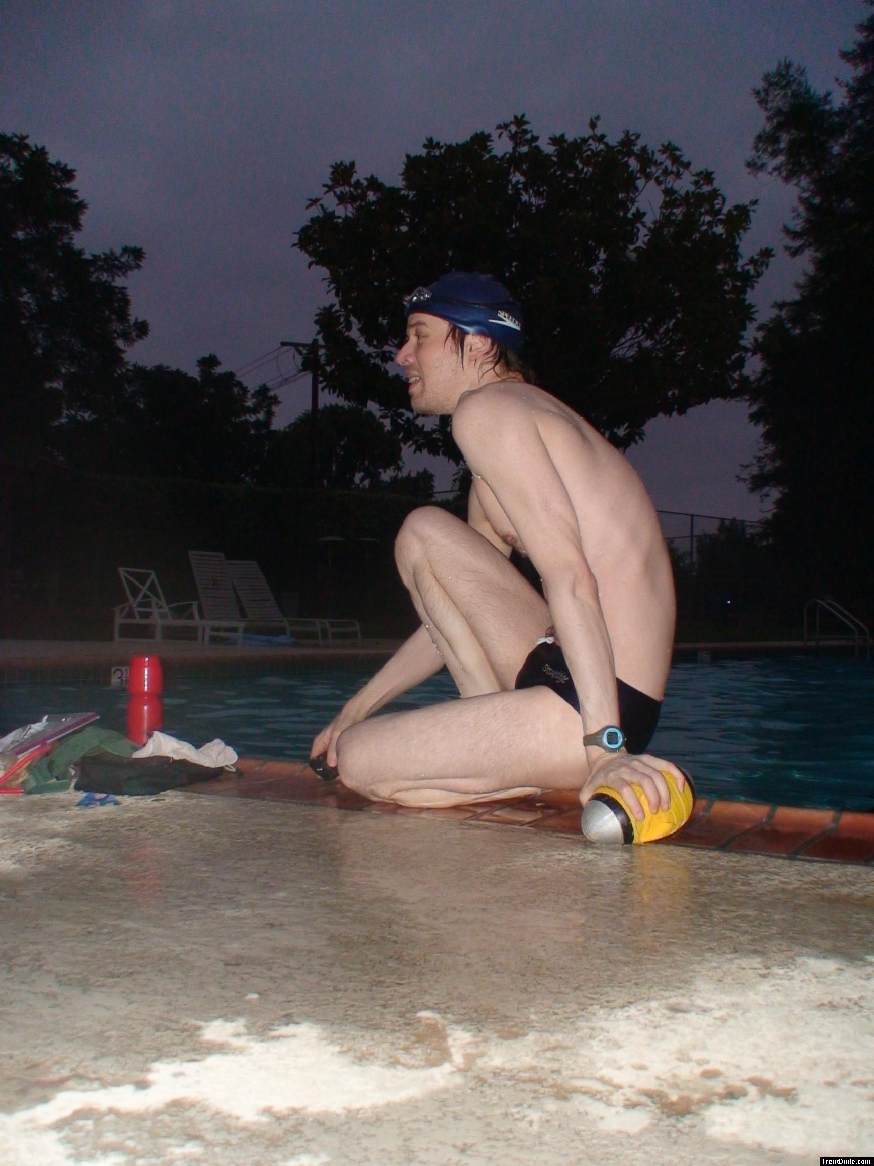 Swim team speedo size 30, relaxing next to the pool