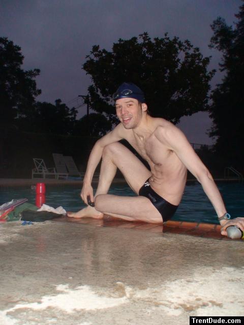 Swim team speedo size 30, relaxing next to the pool