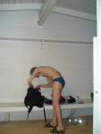 In the locker room wearing a size small swim brief, getting ready