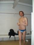 In the locker room wearing a size small swim brief