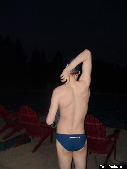 swimmer wearing Calvin Klein - Hipster Swim Brief Color: Lagoon/Marina (rear)