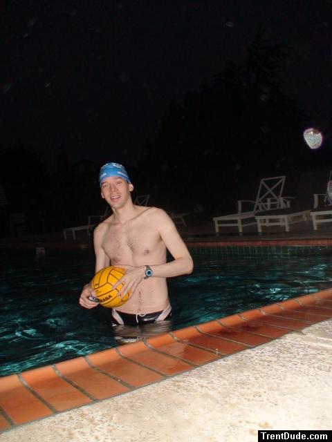 Holding a water polo ball in blue swim cap (best)
