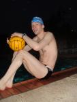 at pool with a water polo ball (legs), blue Finis swim cap