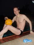 at pool with a water polo ball (legs)