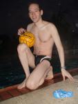 Holding a new Mikasa yellow water polo ball, from amazon.com sports