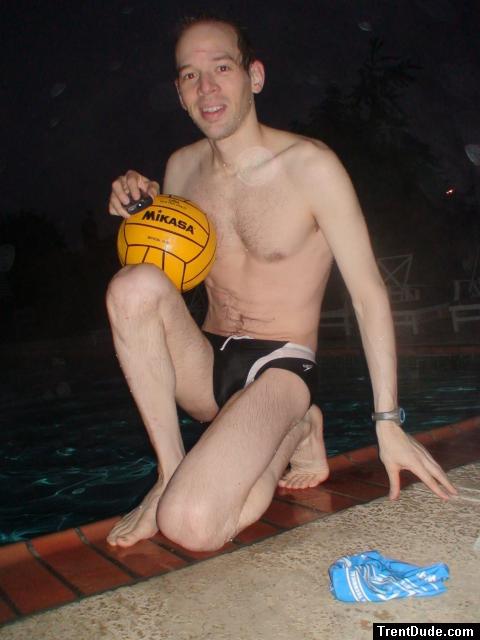 Holding a new Mikasa yellow water polo ball, from amazon.com sports
