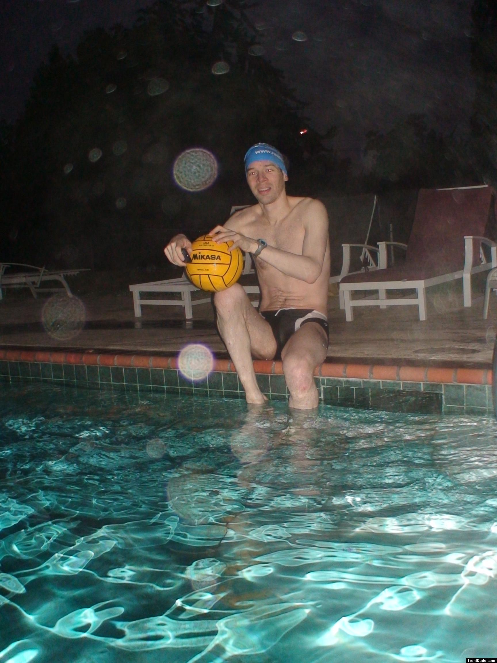 Holding a water polo ball in the rain