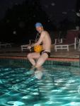 Holding a water polo ball in the rain