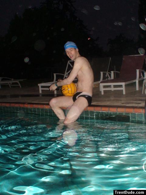 Holding a water polo ball in the rain