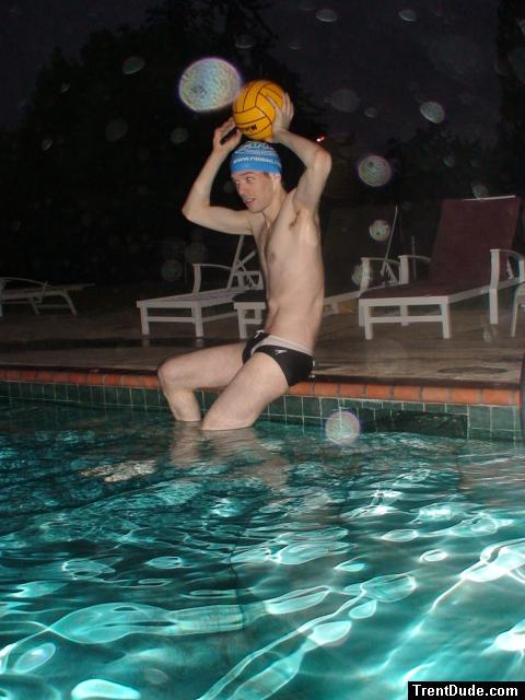 Lean swimmer about to throw a water polo ball in a black/white speedo (best)