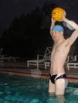 Jumping water polo player throwing a ball in a speedo (armpit) (best)