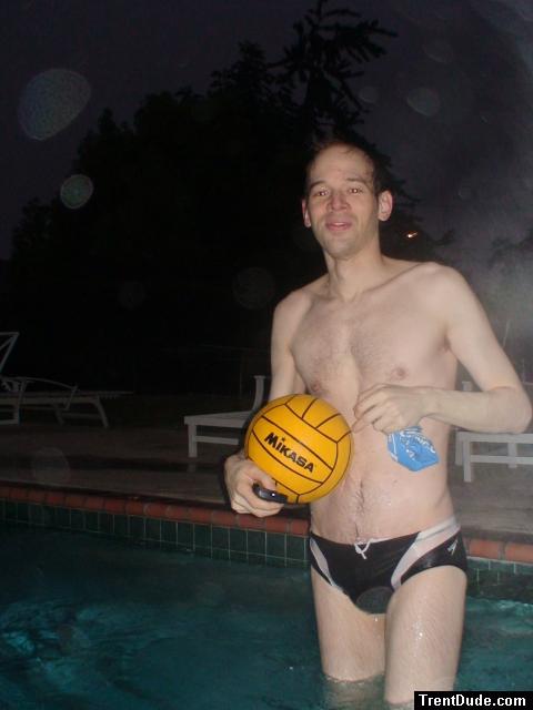Lauging Waterpolo dude holding a yellow Mikasa ball