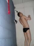 Shampooing in a black speedo