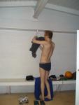 Blue  hanes, water polo ball on the locker room bench