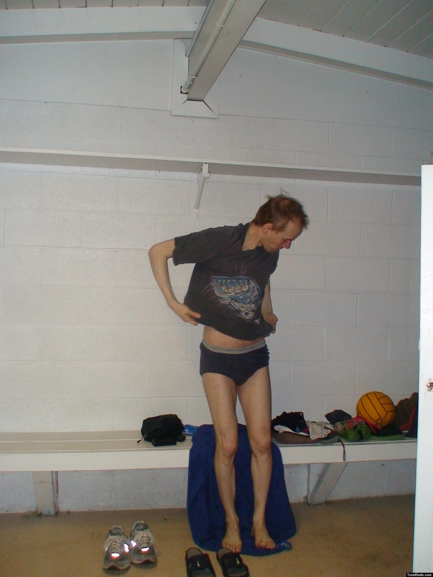 Blue  hanes, water polo ball on the locker room bench