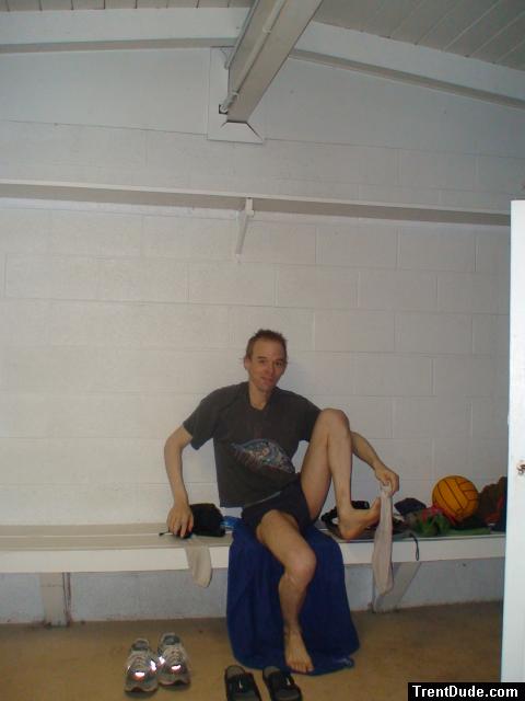 Putting on socks, water polo ball on the ench (feet)