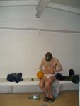 Tieing the white speedo so that it doesn't slip off doing flip turns.  34" is a bit large for him.
