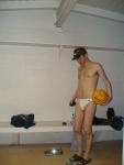 His blue hanes are thrown on the pile on the bench