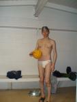 Wearing a white speedo in the locker room