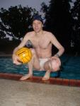 Chest hair visible in a White Speedo, Mikasa water polo ball, blue swim cap
