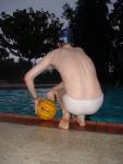 His back is so pale from avoiding sun induced skin damage, it matches his speedo