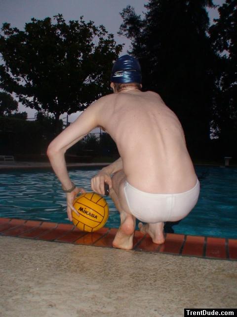 His back is so pale from avoiding sun induced skin damage, it matches his speedo