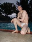 Swimmer in a white speedo (bulge) (feet) (best) (legs)